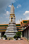 Bangkok Wat Pho, phra prang tower at the corner of the courtyard around the bot.